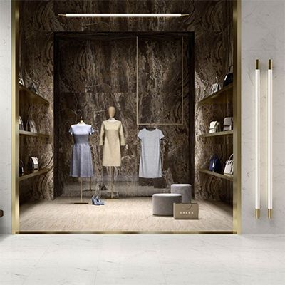 Combineer bruine tegels met goud en wit accenten